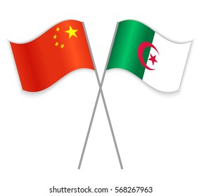 Chinese and Algerian crossed flags. China combined with Algeria isolated on white. Language learning, international business or travel concept.