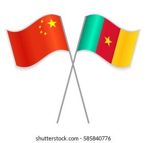 Chinese and Cameroonian crossed flags. China combined with Cameroon isolated on white. Language learning, international business or travel concept.