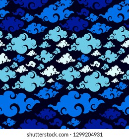 Chinese Cloud or Japanese cloud or Oriental cloud low detail ornament seamless pattern with gradient indigo blue tone theme vector background 