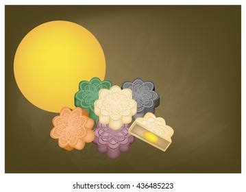 Chinese Cuisine, Chinese Moon Cake Filled with Red Bean or Lotus Seed Paste for Chinese Mid-Autumn Festival on Black Chalkboard. One of Most Popular Dessert in China.
