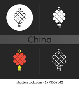 Chinese knotting dark theme icon. Nuptial ornament with tassel. Asian lucky charm. Lunar New Year celebration. Linear white, simple glyph and RGB color styles. Isolated vector illustrations