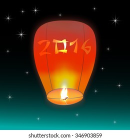 Chinese lantern, flying in the night sky star with numbers 2016 on it