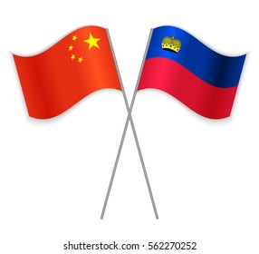 Chinese and Liechtenstein crossed flags. China combined with Liechtenstein isolated on white. Language learning, international business or travel concept.