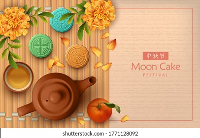 Chinese mid autumn festival background. Bamboo mat with traditional moon cakes, teapots, tea cups and marigold flowers. Translation of Chinese characters - Mid Autumn Festival