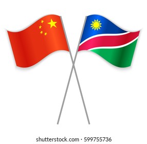Chinese and Namibian crossed flags. China combined with Namibia isolated on white. Language learning, international business or travel concept.