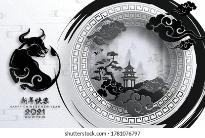 Chinese new year 2021 year of the ox , red paper cut ox character,flower and asian elements with craft style on background.(Chinese translation : Happy chinese new year 2021, year of ox)