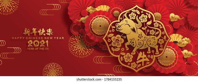 Chinese new year 2021 year of the ox , red paper cut ox character,flower and asian elements with craft style on background.(Chinese translation : Happy chinese new year 2021, year of ox)