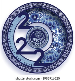 Chinese new year 2022 year of the tiger blue and blue ceramic porcelain elements paper cut with craft style on background.( translation : chinese new year 2022, year of tiger 