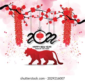 Chinese new year 2022 year of the tiger red and gold flower and asian elements paper cut with craft style on background.( translation : chinese new year 2022, year of tiger )