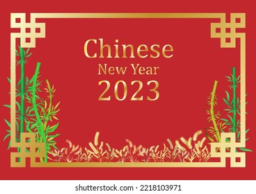 chinese new year 2023 with green and yellow bamboo There is a golden rice plant at the bottom and a gold lettering in the center of the image on a red background, symbolizing happiness and wealth.