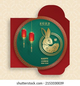 Chinese new year 2023 lucky red envelope money packet on color background for the year of the Rabbit (Translation : happy Chinese new year 2023, year of the Rabbit)