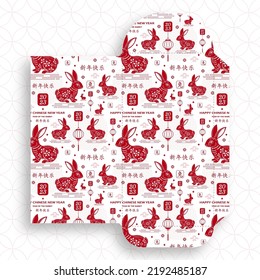 Chinese new year 2023 lucky red envelope money packet on color background for the year of the Rabbit (Translation : happy Chinese new year 2023, year of the Rabbit)