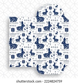 Chinese new year 2023 lucky blue envelope money packet on color background for the year of the Rabbit (Translation : happy Chinese new year 2023, year of the Rabbit)