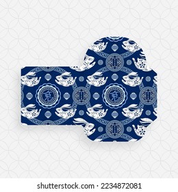 Chinese new year 2023 lucky blue envelope money packet on color background for the year of the Rabbit (Translation : happy Chinese new year 2023, year of the Rabbit)
