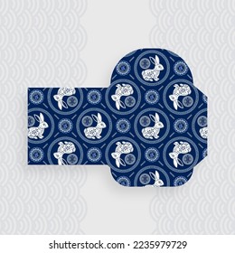 Chinese new year 2023 lucky blue envelope money packet on color background for the year of the Rabbit (Translation : happy Chinese new year 2023, year of the Rabbit)