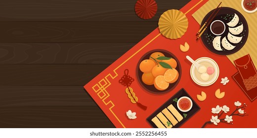 Chinese New Year celebration with traditional food and decorations on the table at home, top view, copy space