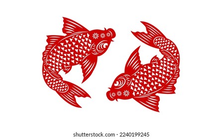 Decoración china de Año Nuevo. Cortan papel de pescado rojo. Elementos artesanales asiáticos tradicionales. Pinza de sobre y sobre rojo.