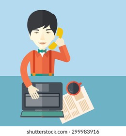 A chinese office man sitting at his working desk with his laptop and having a telephone conversation. Business concept. A contemporary style with pastel palette soft blue tinted background. Vector