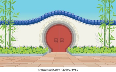 Chinese old red circle door with bamboo. Gate to a Chinese garden or temple