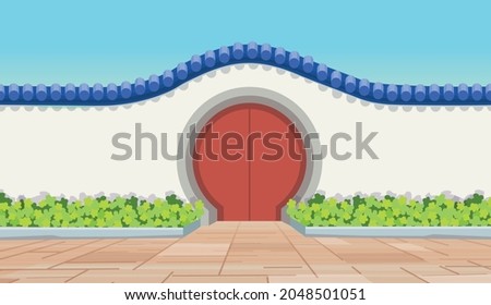 Chinese old red circle door. Gate to a Chinese garden or temple