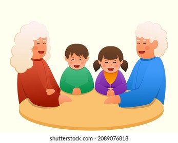 Chinese Older Couple With Grandchildren Together Sitting Around Table.