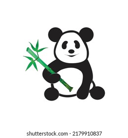 chinese panda eating bamboo leaves, cute black and white teddy bear