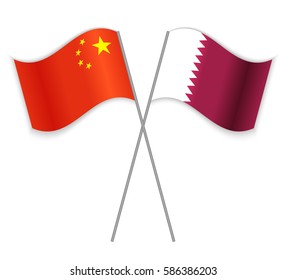 Chinese and Qatari crossed flags. China combined with Qatar isolated on white. Language learning, international business or travel concept.