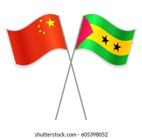 Chinese and Sao Tomean crossed flags. China combined with Sao Tome and Principe isolated on white. Language learning, international business or travel concept.