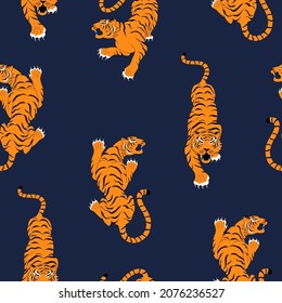 Chinese tigers seamless pattern on navy background. Vector design for textiles, wrapping paper, wallpapers.