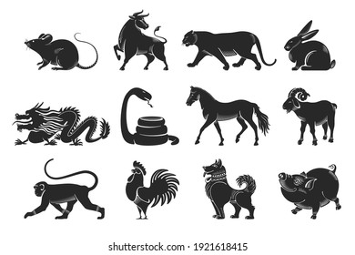 Chinese zodiac signs set. The set consists of twelve animal silhouettes drawn in a graphic or engraved style. Vector illustration.