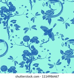 Chinoiserie seamless pattern. Vector illustration with silhouette. Chinese background.  Birds, peonies, dragonfly. Wallpaper design. Blue background.