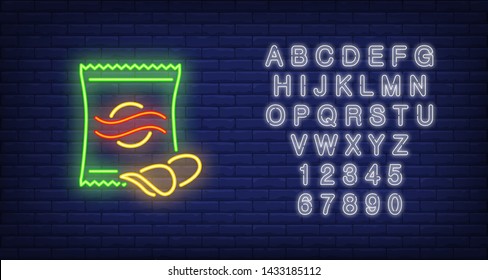 Chips packet neon sign. Glowing illustration of green packet with potato chips on dark blue brick background. Can be used for store, shops, supermarkets, advertisement