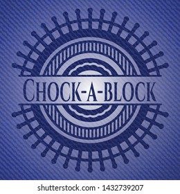 Chock-a-block emblem with jean high quality background. Vector Illustration. Detailed.