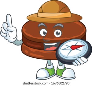 Chocolate alfajor an experienced explorer working using a compass