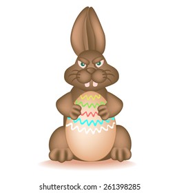 Chocolate bunny easter egg grabbed