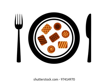 Chocolate candies on porcelain plate