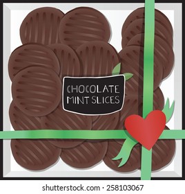 Chocolate cookies in a box with a note.