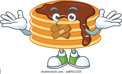 Chocolate cream pancake mascot cartoon design with a quiet gesture.