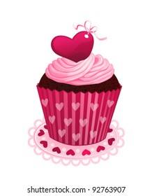 Chocolate cupcake with pink cream and red sugar heart