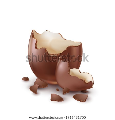 Chocolate egg, child's surprise for Easter and holidays, broken.