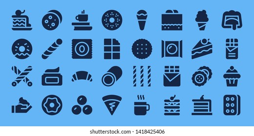 chocolate icon set. 32 filled chocolate icons. on blue background style Collection Of - Cake, Doughnut, Liquorice, Cream, Cookie, Stick candy, Donut, Coffee, Candy, Croissant