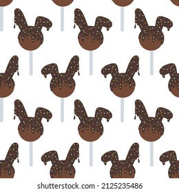 Chocolate lollipop with bunny ears seamless pattern. Vector illustration of chocolate lollipop in cartoon style isolated on white background. Lollipop with sweets and chocolate. Sweets background. 