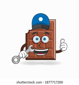 The Chocolate mascot character becomes a mechanic. vector illustration