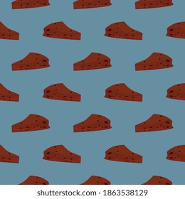 Piezas de chocolate, patrón sin fisuras sobre fondo azul.