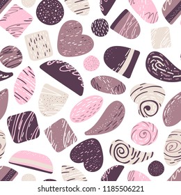 Chocolate sweets candies, seamless vector pattern. For paper, wallpaper, textiles, etc.