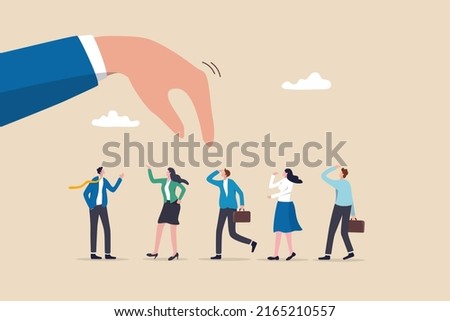 Choosing candidate for job vacancy, human resources or manager pick success candidate, searching for success people concept, giant businessman hand HR pick up winner from group of job candidate.