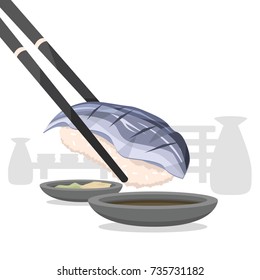 Chopsticks holding Japanese sardine sushi 