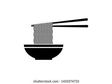 Chopsticks are holding the noodles from the cup on a white background.