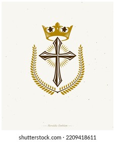 Christian Cross decorative emblem. Heraldic vector design element composed with laurel wreath and imperial crown. Retro style label, heraldry logo, religious vintage symbol.