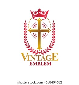 Christian Cross golden emblem created with royal crown and laurel wreath. Heraldic Coat of Arms decorative logo isolated vector illustration. Religion and spirituality theme symbol.